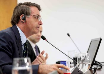 O presidente Jair Bolsonaro durante videoconferência com líderes do G20 sobre a Covid-19 (Foto: Marcos Correa/Presidência da República via Xinhua)