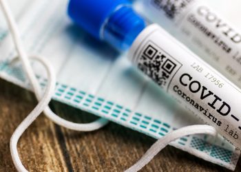 dangerous coronavirus Covid-19 virus in a laboratory - infection of 2019-nCoV virus.  Global pandemic risk due to coronavirus outbreak