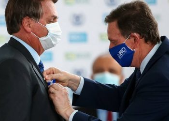 O presidente Jair Bolsonaro e o prefeito Marcelo Crivella durante agenda em setembro (Foto: Buda Mendes/Getty Images)